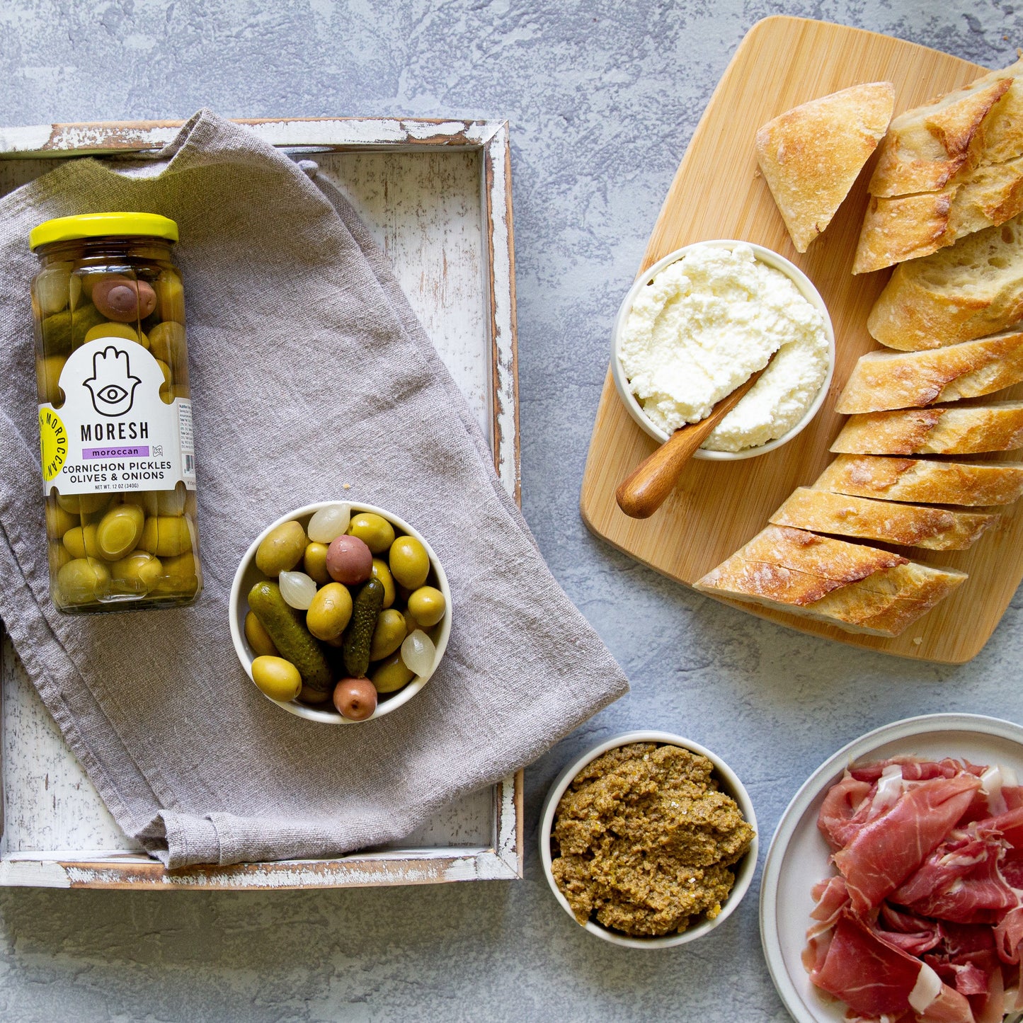 Green Olives Tapenade and Prosciutto Crostini