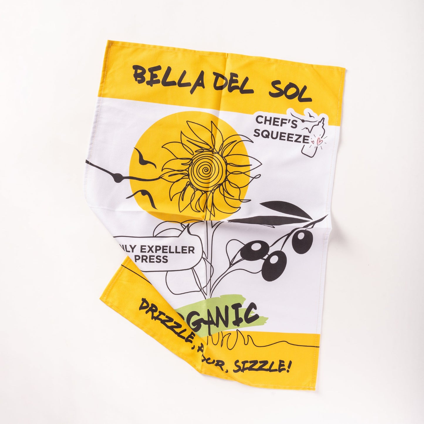 Bella Del Sol tea towel laid flat on a white background, featuring a clean cotton texture and the brand’s logo in a bright design.