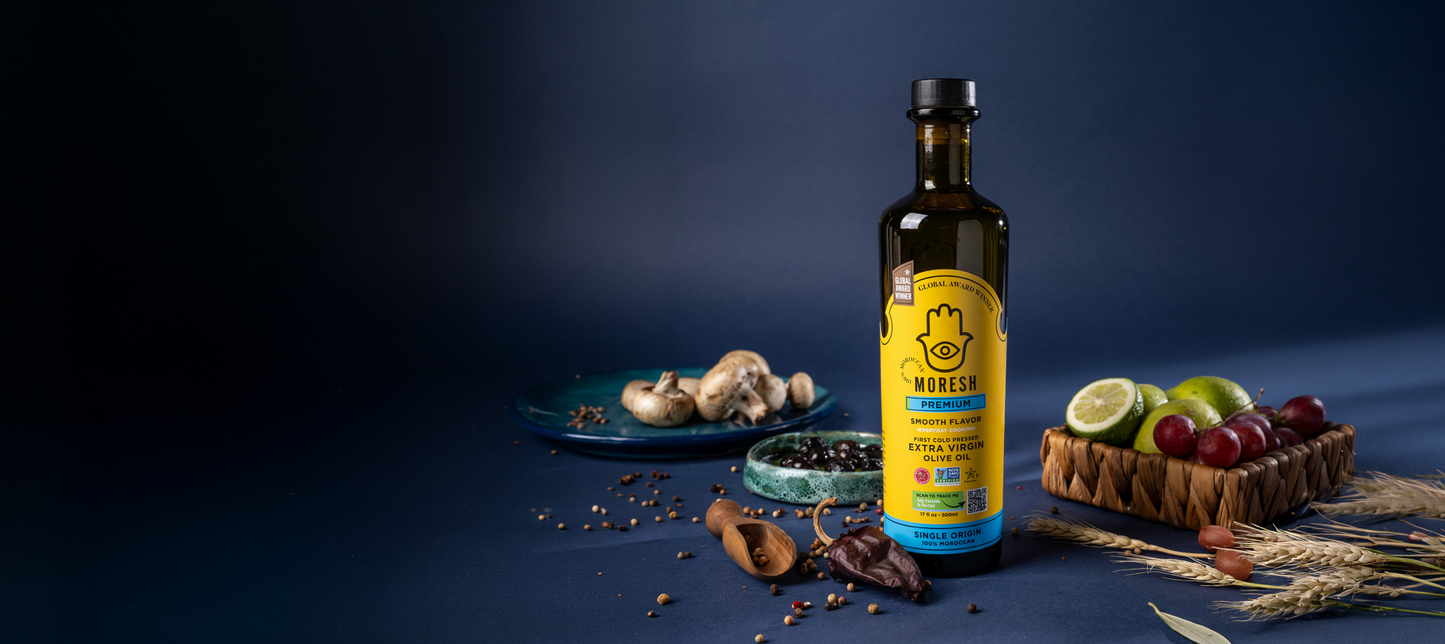 A picture featuring Moresh Premium Olive Oil 500ml with different fruits and spices