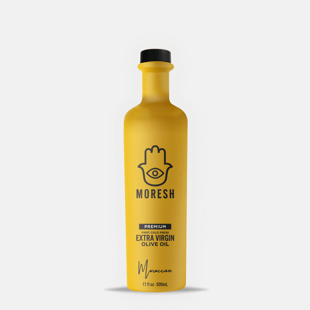 
                  
                    Yellow bottle of Moresh olive oil on a white background
                  
                