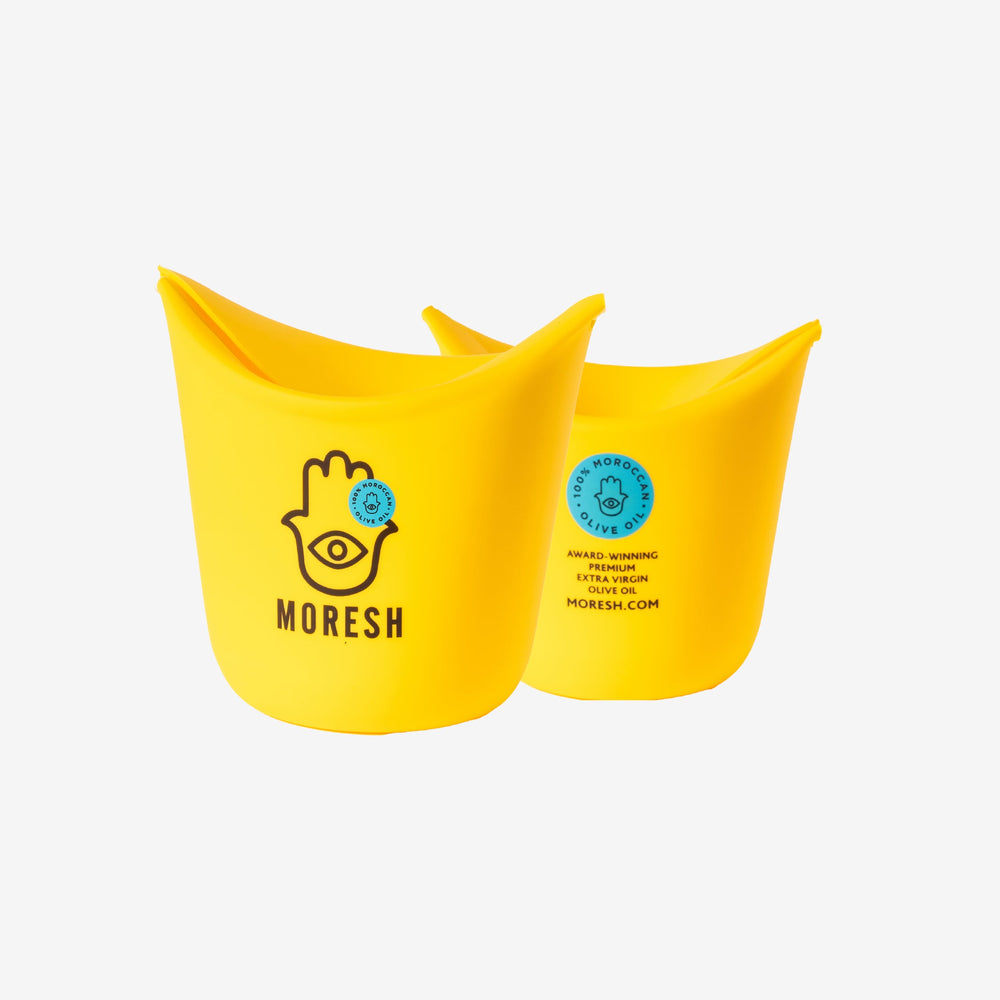 Front and back view of the yellow Moresh single-serve silicone popcorn popper, featuring a modern logo and sleek foldable design ideal for quick microwave snacking.